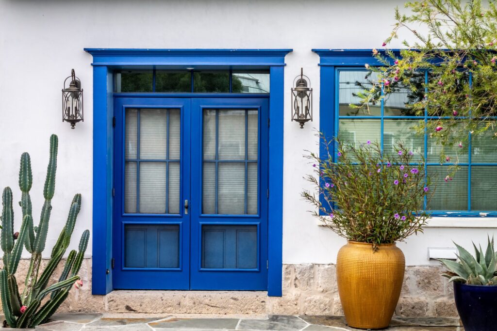 An image of a blue front door of a house in Arizona